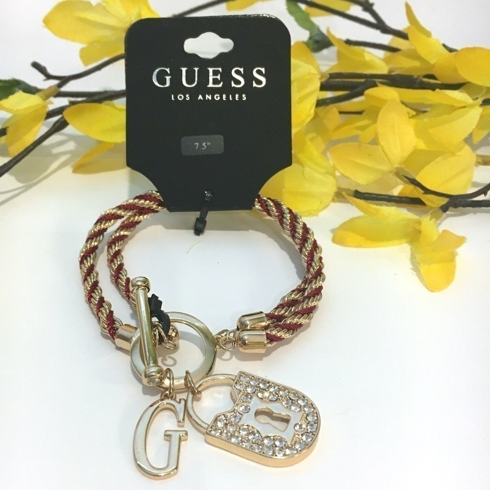𝅺3/$29! GUESS Twisted Rope Bracelet with Lock